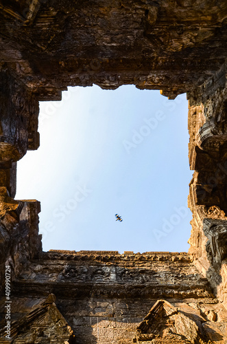 Low angle shot of the ruins of the Martand Sun Temple under the sunlight in India photo