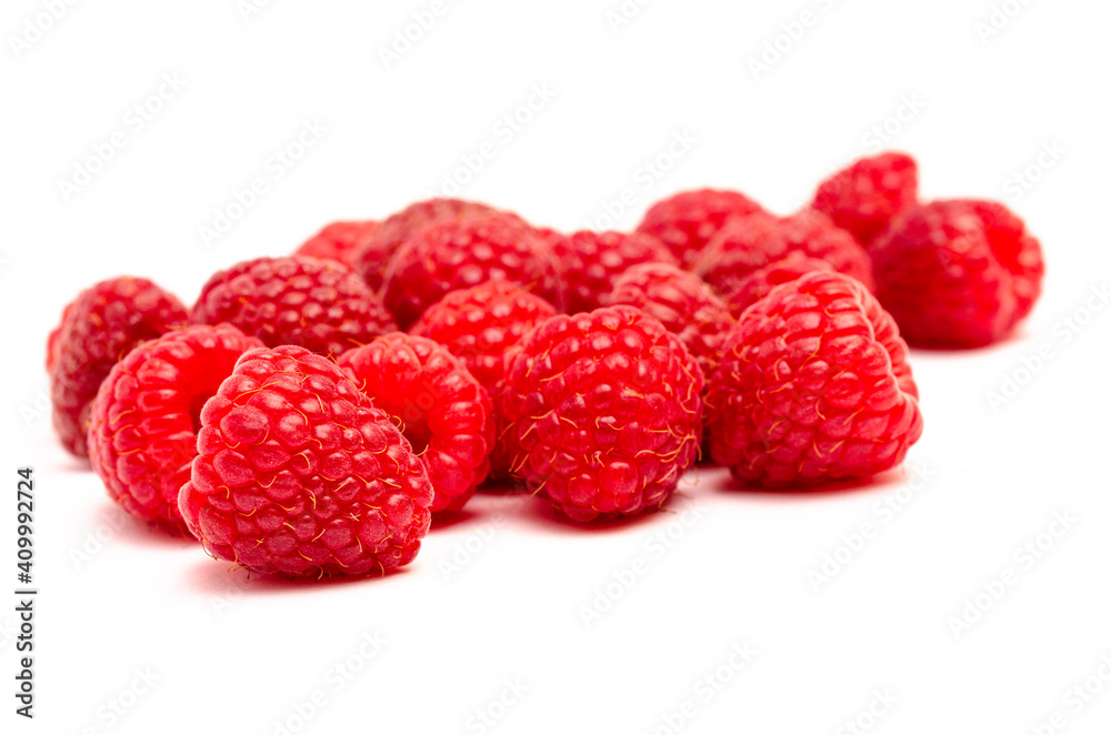 Closeup of red raspberry berries on white background Closeup of red raspberry berries on white background