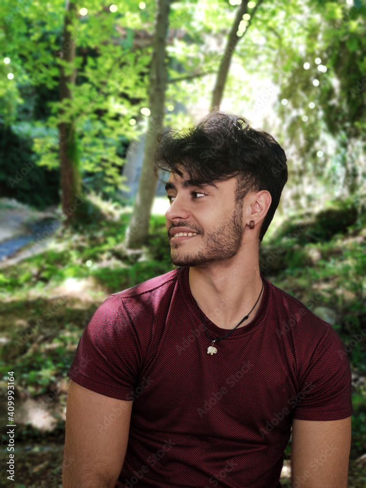 Hispanic man portrait with red t-shirt, smiling. Hispanic man portrait with red t-shirt, smiling.