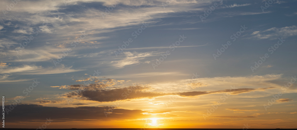 The evening sunset. Panorama. Majestic Storm Clouds. Tragic gloomy sky.