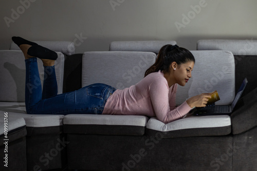 Young woman studying online from home