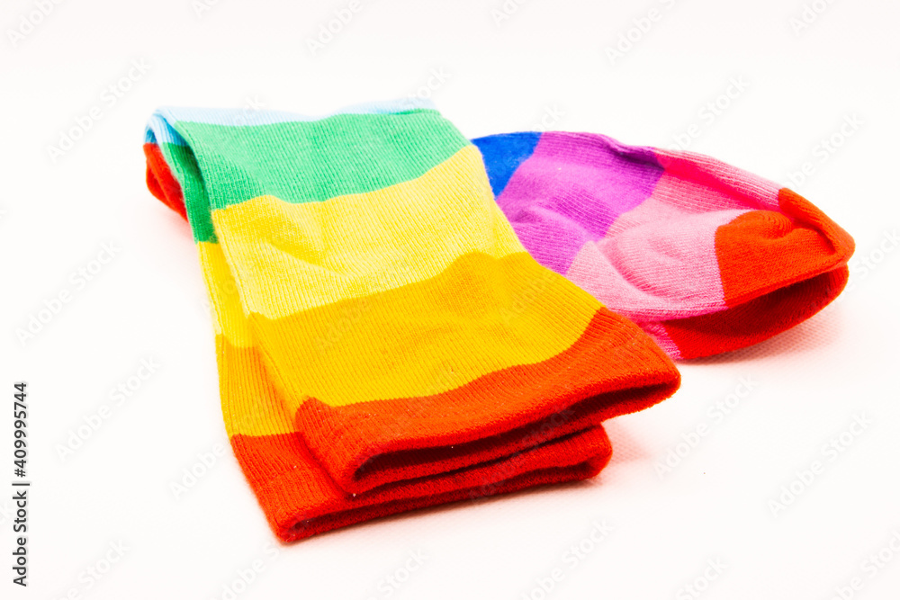 Isolated colorful rainbow striped socks on white background Isolated colorful rainbow striped socks on white background