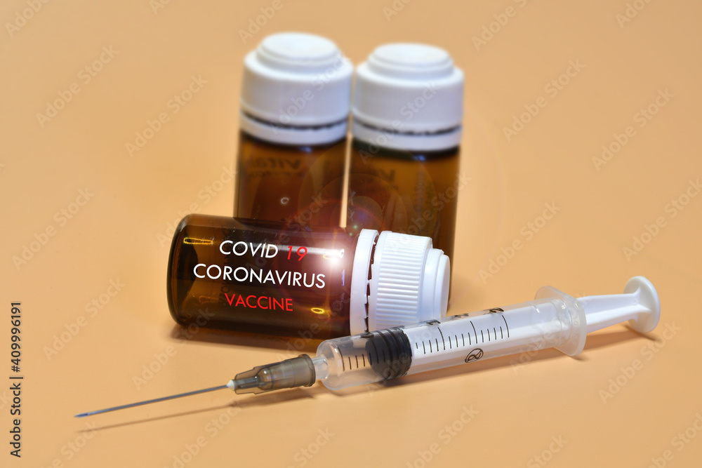 Covid-19 coronavirus vaccine. Syringe and vaccine vial. Treatment for coronavirus covid-19. Covid-19 coronavirus vaccine. Syringe and vaccine vial. Treatment for coronavirus covid-19.