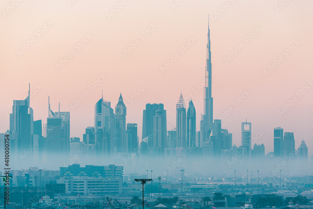 Dubai city skyline at morning fog Dubai city skyline at morning fog