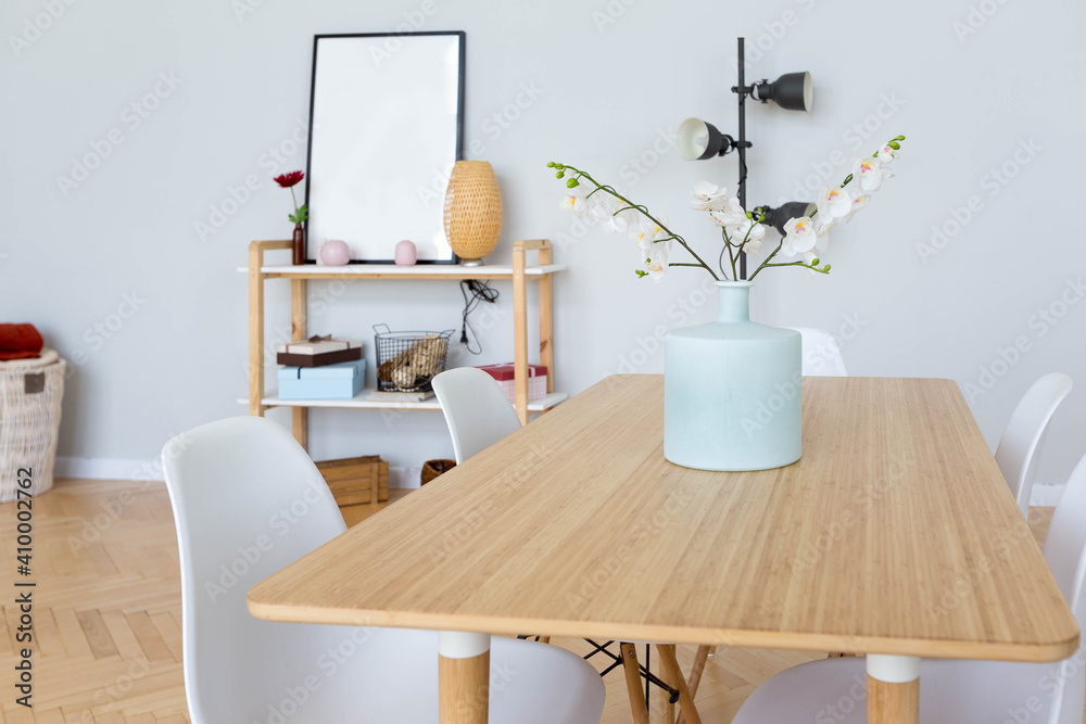 The interior design of the studio apartment in Scandinavian style. A spacious huge room in light colors. stylish expensive luxury furniture.