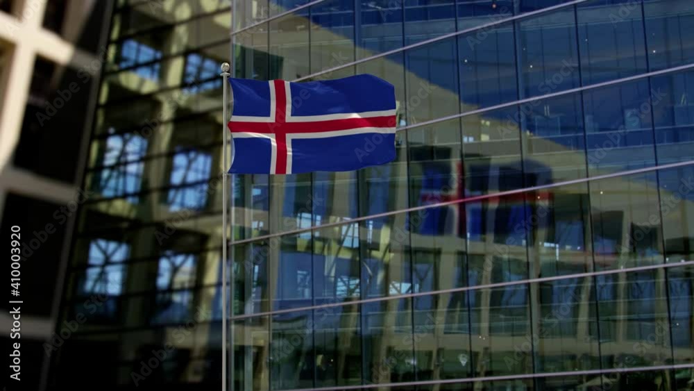 Iceland Flag Waving On A Skyscraper Building Iceland Flag Waving On A Skyscraper Building