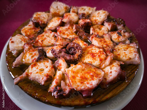 Traditional Galician octopus dish seasoned with oil and paprika  
