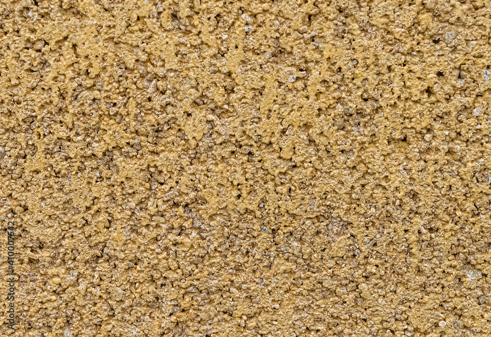 Sand colored artificial sandstone texture Sand colored artificial sandstone texture