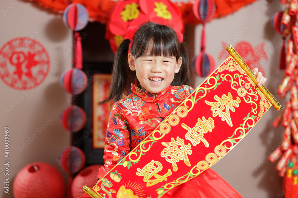 young chinese girl with traditional dressing up holding 