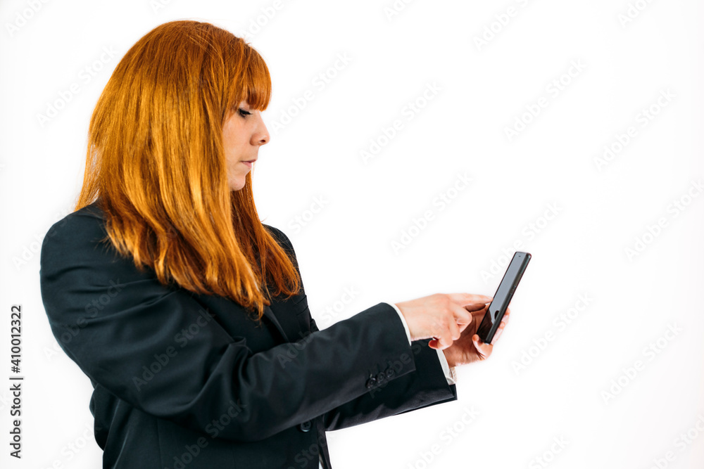Closeup shot of a businesswoman typing on her phone on an isolated background. copy space. Closeup shot of a businesswoman typing on her phone on an isolated background. copy space.