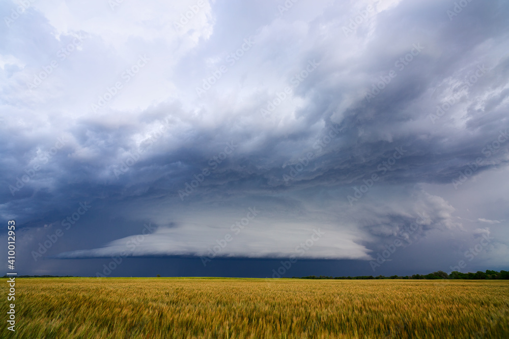 Storm clouds over a field in Oklahoma Storm clouds over a field in Oklahoma
