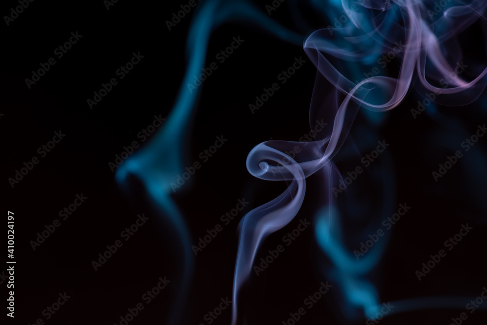 random shapes of colored smoke fired with colored flash