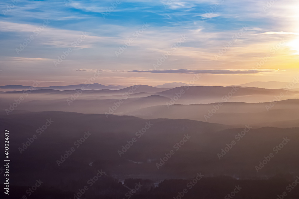 beautiful view from the mountains.  mountain valley.  relief landscape.  hilly area against the sky.