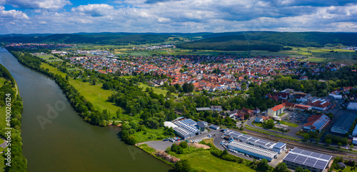 Fototapeta Naklejka Na Ścianę i Meble -  Aeriel view of the city Großheubach in Germany on a cloudy day in spring	