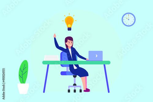 Businesswoman getting bright new idea while working with laptop on desk
