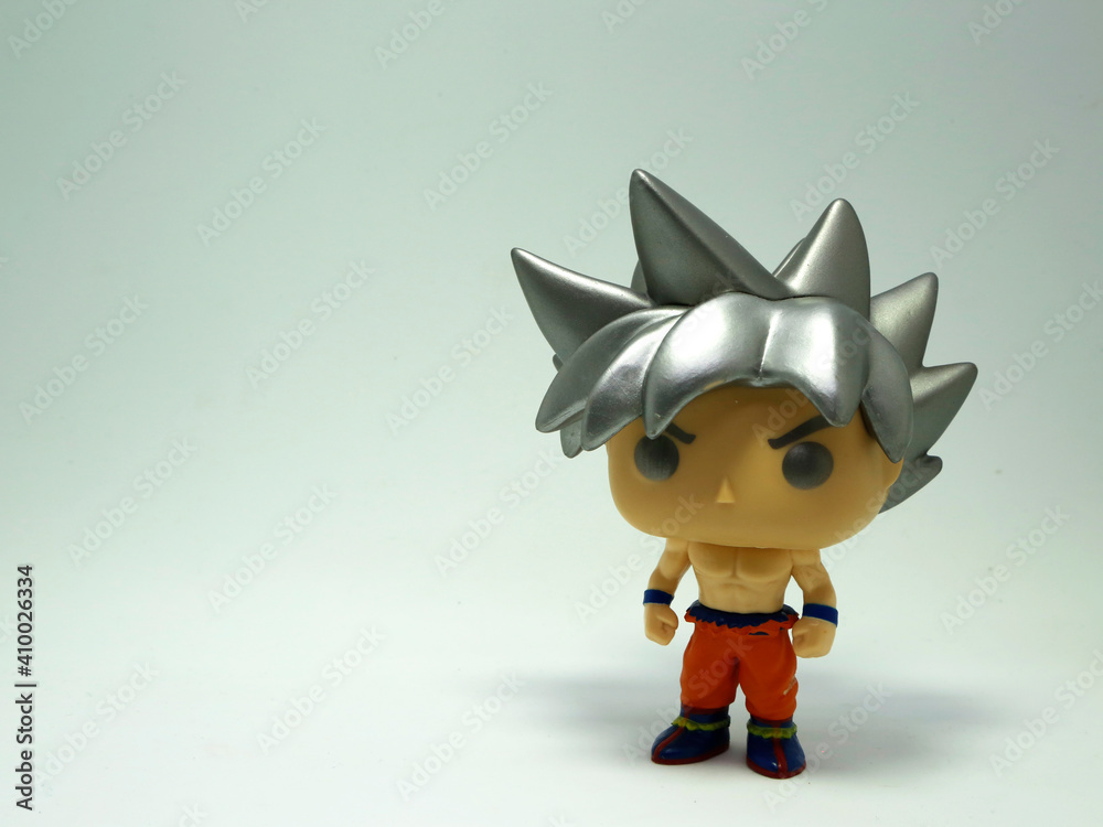 Funko pop Goku. Dragon Ball Z. Manga. Anime. Super saiyan. Cartoon. Akira  Toriyama. White background. Grey hair. Stock Photo | Adobe Stock