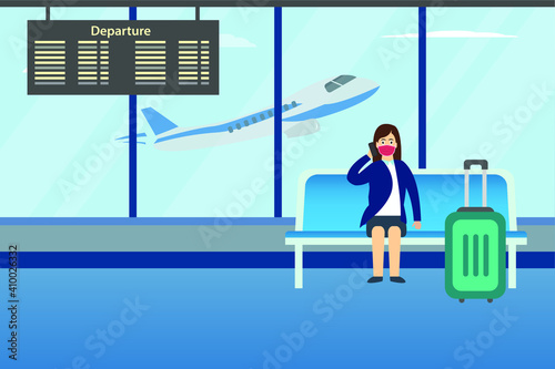 Businesswoman making a phone call while sitting on the lounge at the airport terminal