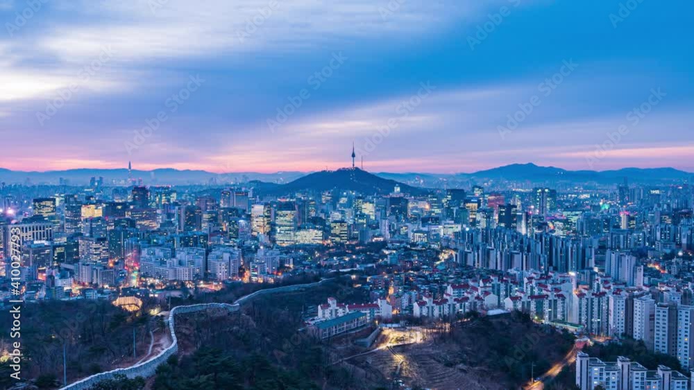 Seoul city skyline and Seoul tower modern building from nigth to day for showing routine metropolitan lifestyle, time lapse effect of scenic cityscape in seoul city south korea(zoom in) Seoul city skyline and Seoul tower modern building from nigth to day for showing routine metropolitan lifestyle, time lapse effect of scenic cityscape in seoul city south korea(zoom in)