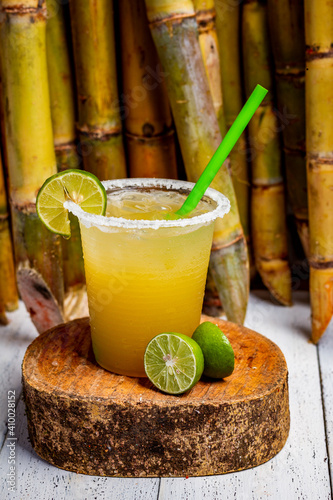 Sugarcane juice, guarapo de caña photo