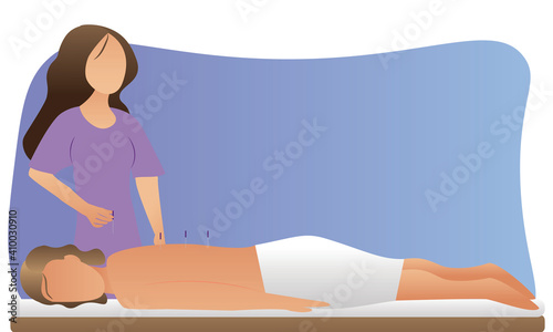 Woman relaxes from acupuncture procedure. An acupuncturist doing acupuncture. Traditional chinese medicine.