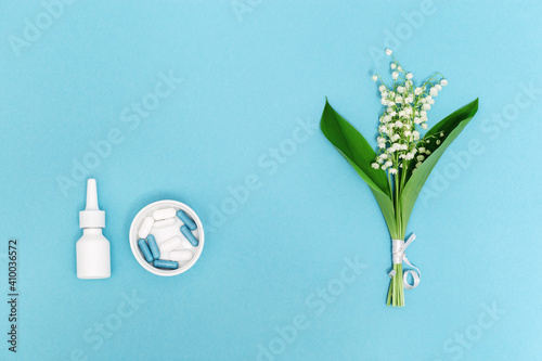 Allergy concept. Nose spray,  tablets and capsules against allergies to pollen of flowering plants -antihistamine drug photo