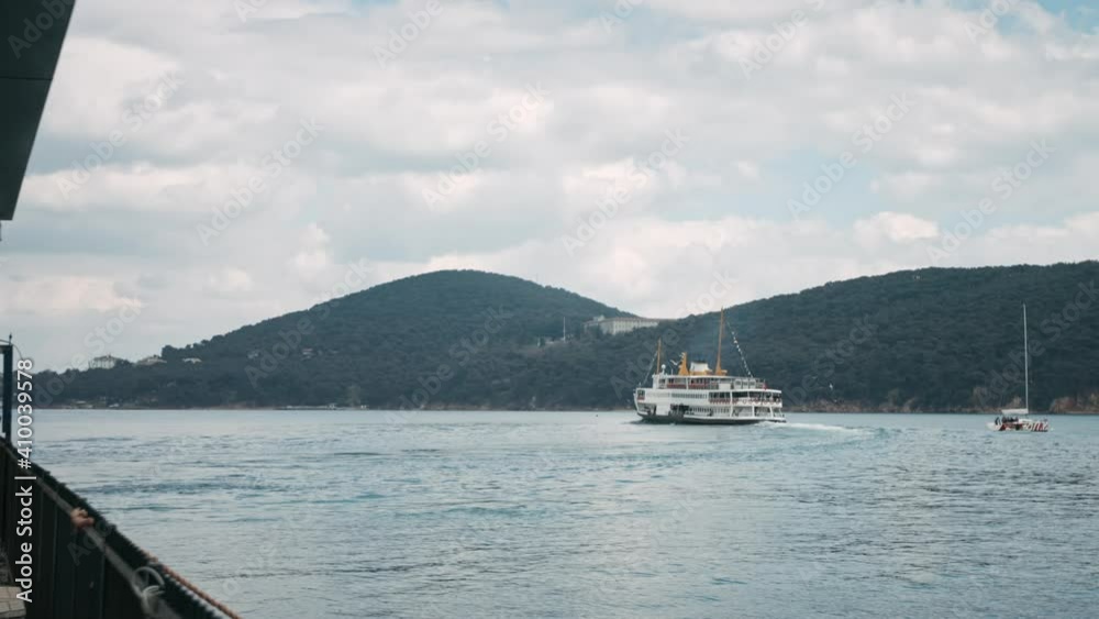 Seascape of Prince Islands in Istanbul with a White Ferry, Ships and Boats Sailing on Marmara Sea with Flying Seagulls in slowmo Seascape of Prince Islands in Istanbul with a White Ferry, Ships and Boats Sailing on Marmara Sea with Flying Seagulls in slowmo