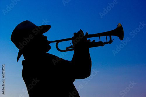 trumpet player silhouette