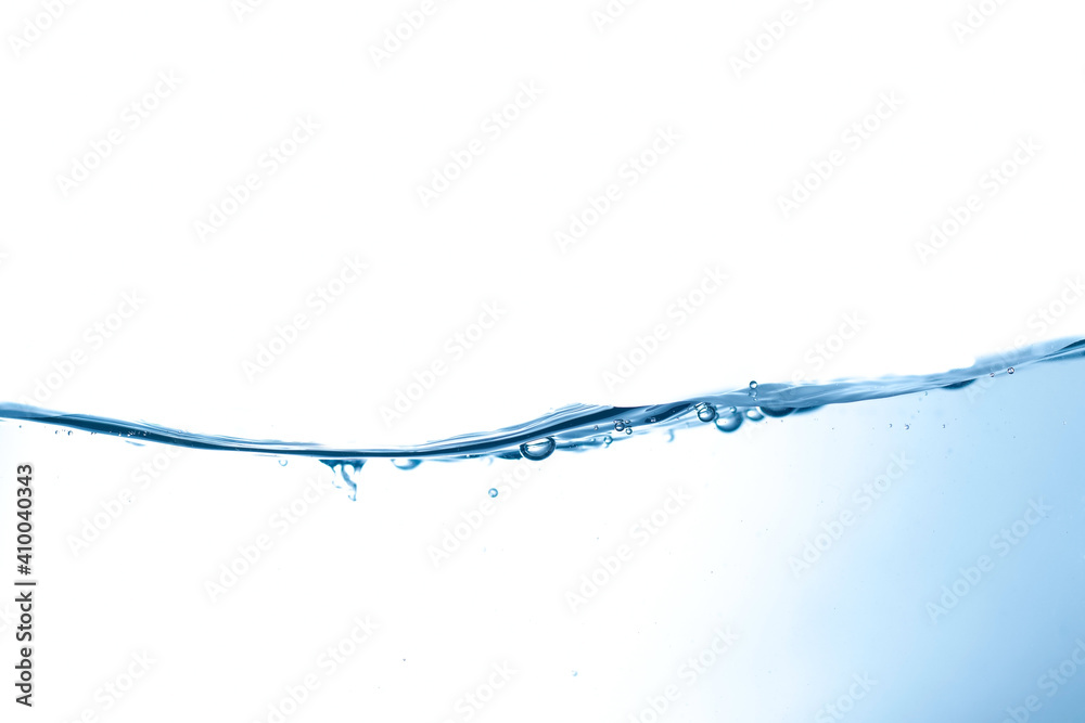 Pour water into a glass of water to make soap bubbles.	