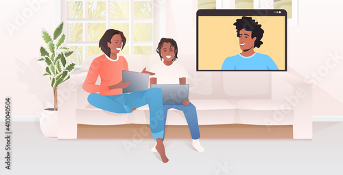 woman and little son discussing with husband in web browser window self-isolation virtual meeting family chat communication concept horizontal vector illustration