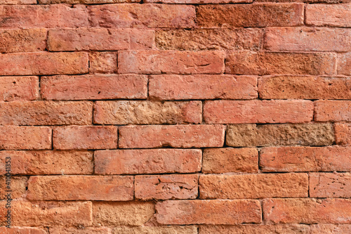 red brick wall © Arthit