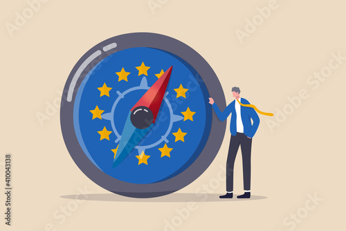 European Union economic direction after Brexit and COVID-19, EU financial strategy or business and stock market outlook concept, businessman leader standing with direction compass with Euro zone flag.