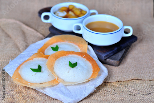 This is Serabi. Traditional Indonesian cake made from rice flour photo