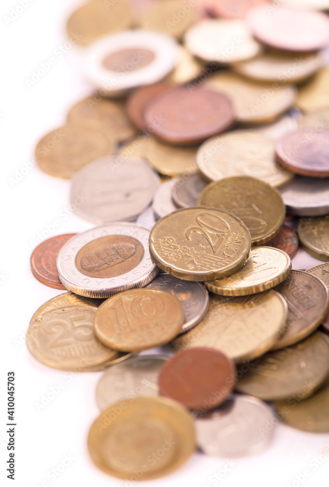 Coins of different countries on a white background. Coins of different countries on a white background.