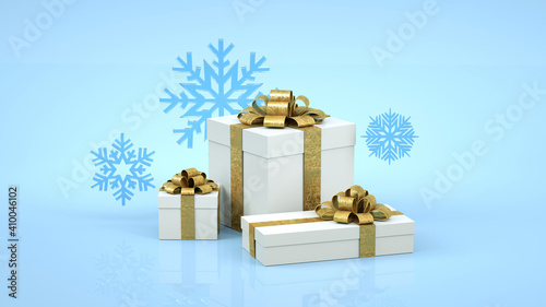 Three white gift boxes with a gold ribbon bow on a blue background with snowflakes.