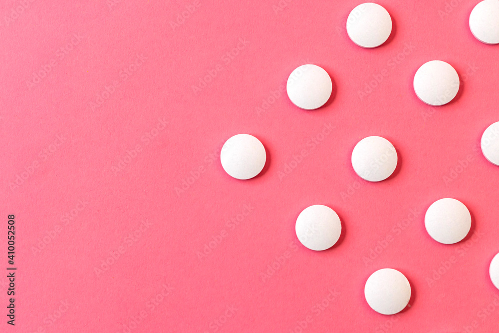 Image of a drug, pill, or treatment. On a pink surface. Image of a drug, pill, or treatment. On a pink surface.