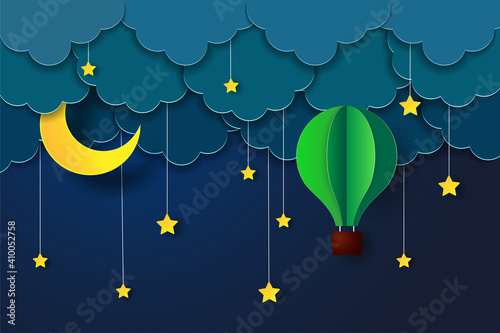 night sky with stars and moon. paper art style. Vector of a crescent moon with stars on a cloudy night sky.
Moon and stars background. Vector EPS 10.