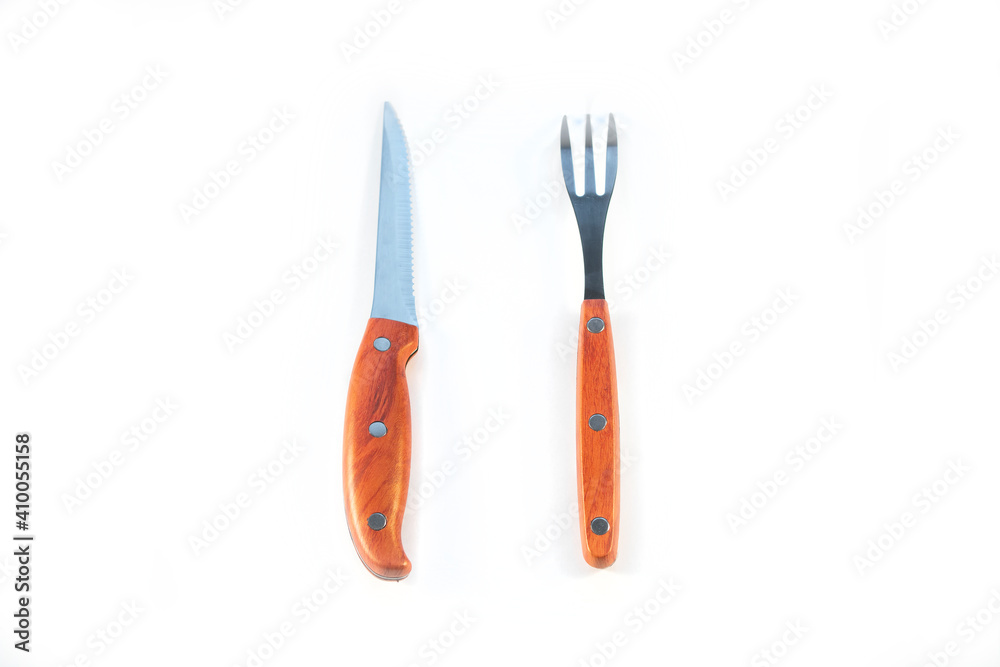 Fork and knife with prongs isolated on white background, photo for design Fork and knife with prongs isolated on white background, photo for design