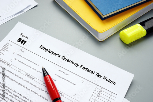 Form 941 Employer's Quarterly Federal Tax Return inscription on the sheet.