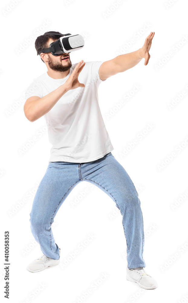 Young man with virtual reality glasses on white background Young man with virtual reality glasses on white background