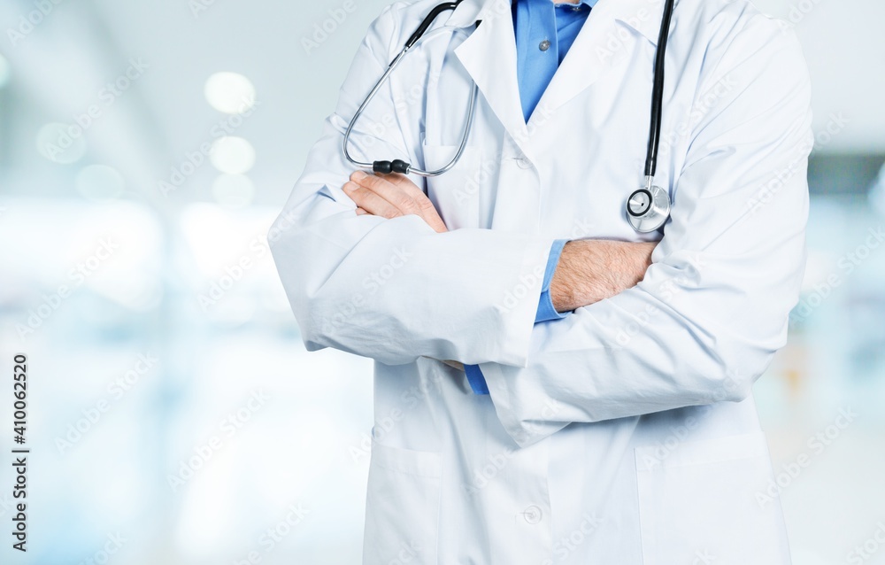Young man doctor holding stethoscope Young man doctor holding stethoscope