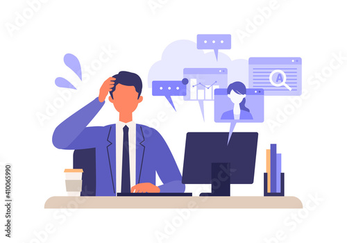 Multitasking businessman working on computer.