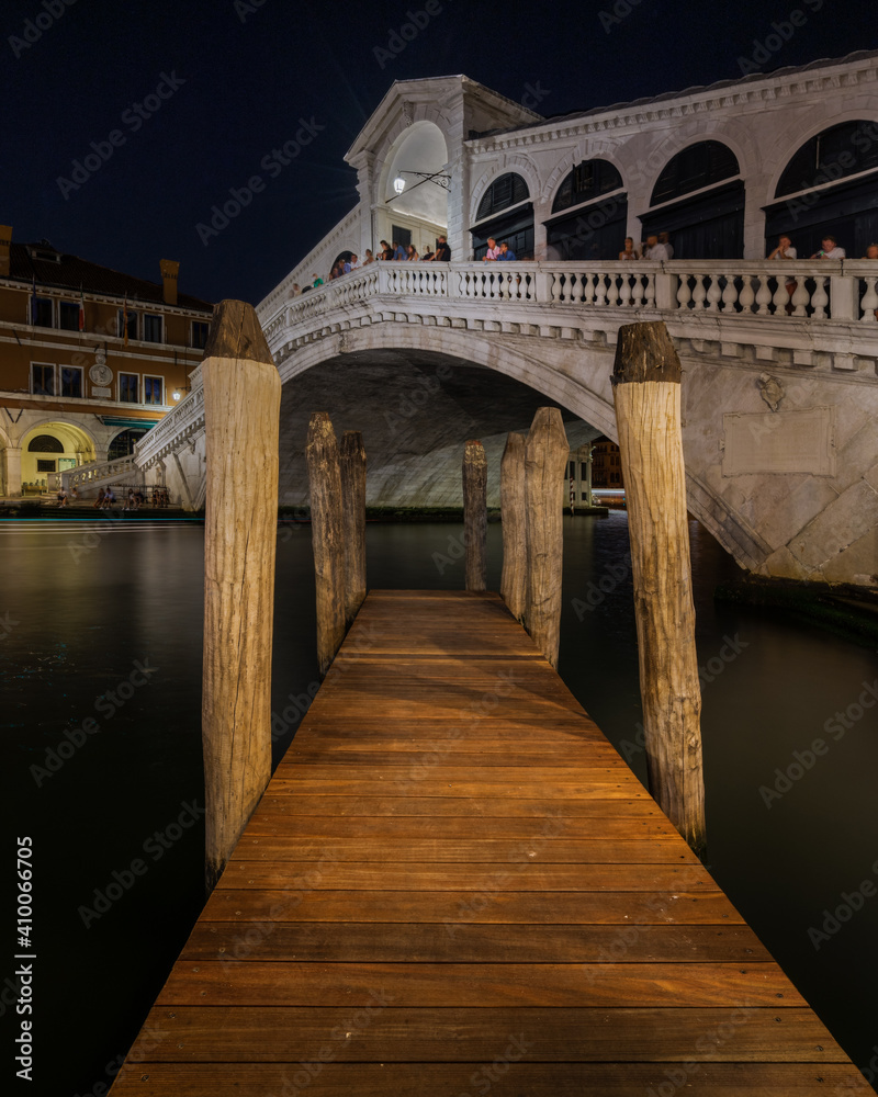 Night view of Rialto Bridge, one of the most popular landmarks in Venice, Italy