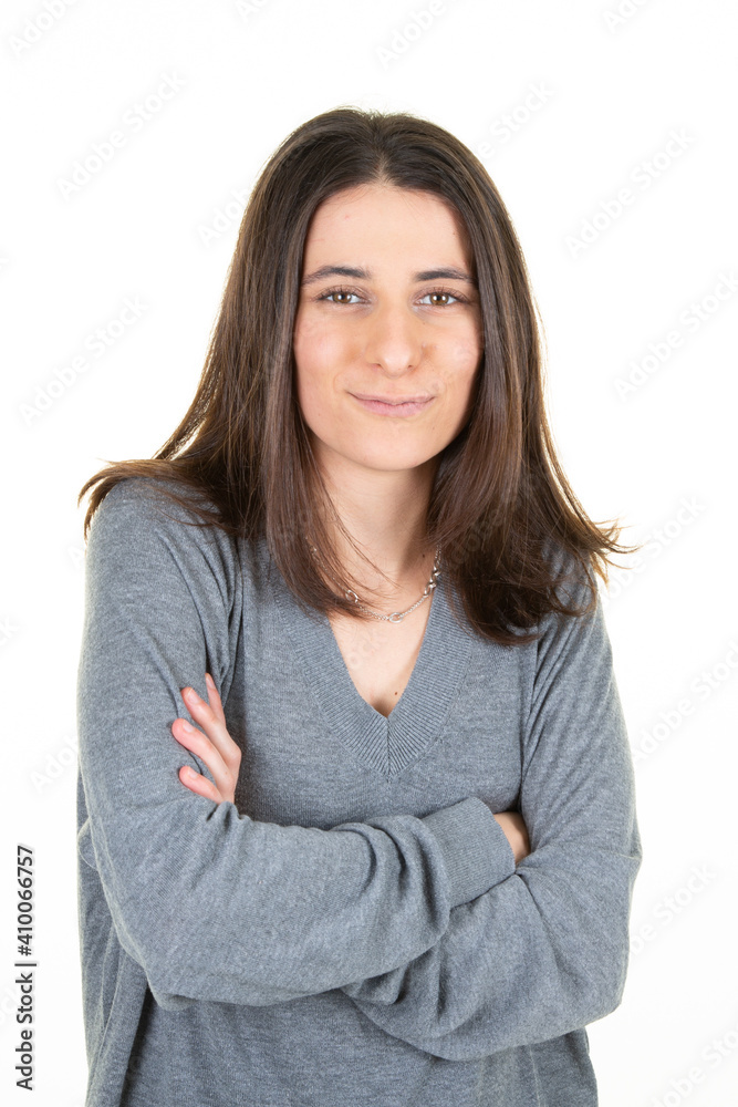 Portrait of beautiful and confident business woman arm crossed on grey sweater Portrait of beautiful and confident business woman arm crossed on grey sweater