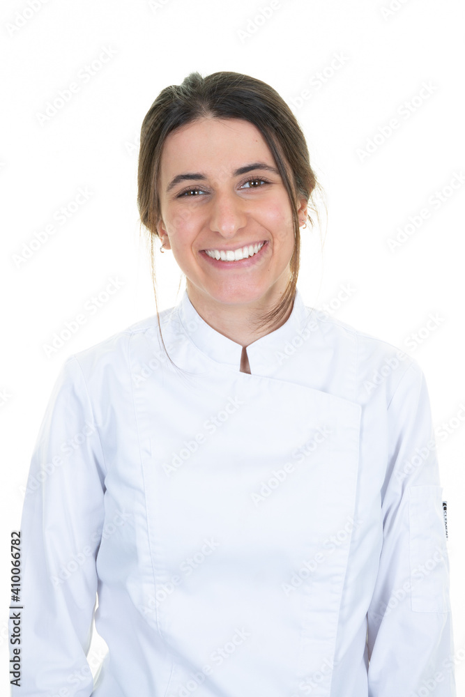 Portrait of young woman chef on light white background Portrait of young woman chef on light white background