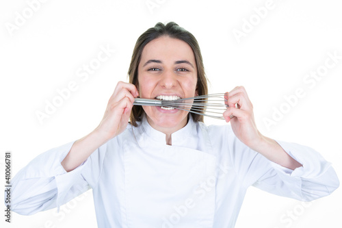 Woman chef fun happy with a mixer hand in her mouth on white background