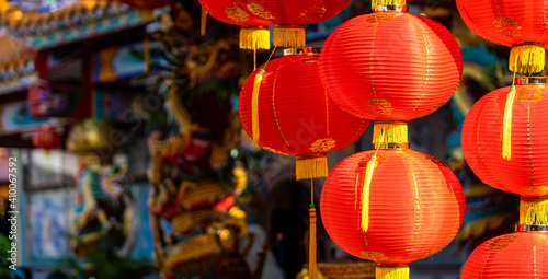 red lantern decoration for Chinese New Year Festival at Chinese shrine Ancient chinese art with the Chinese alphabet Blessings written on it Is a Fortune blessing compliment,Is a public place Thailand © Thinapob