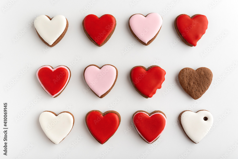 Background from many hearts shaped gingerbread. Valentines Day, white background. Mothers day.