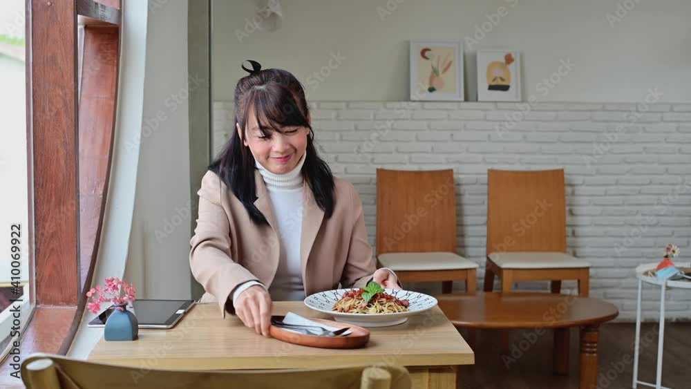 4K Waiter wearing protective mask serving food for people in restaurant during to covid-19 4K Waiter wearing protective mask serving food for people in restaurant during to covid-19