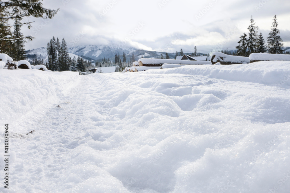 Banks of a mountain stream covered with snow, winter landscape. Banks of a mountain stream covered with snow, winter landscape.