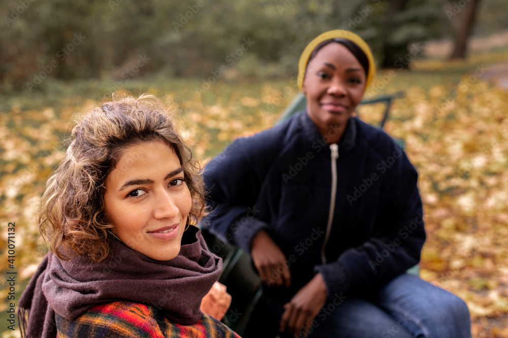 Smiling women looking at camera Smiling women looking at camera